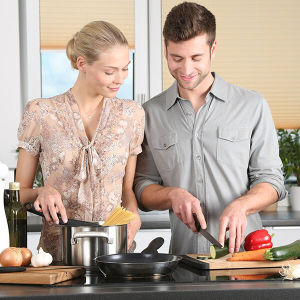 couple cooking together