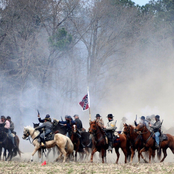 large group of mounted rebel soldiers in a civil war re-enactment