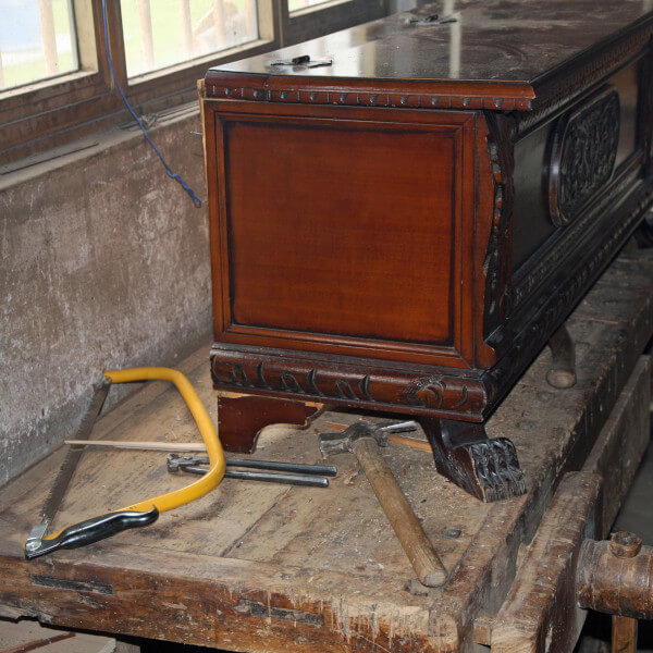 antique dresser in a workshop