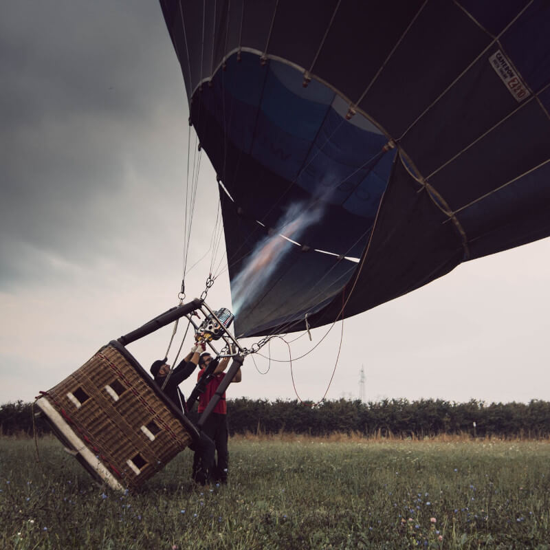 firing hot air into a large balloon